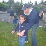 Stone enjoying his first sparkler on the 4th of July (with Mom)