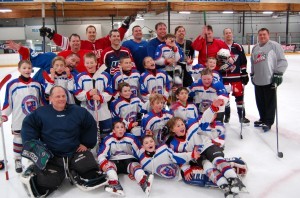 The team photo after the game shows just how much fun the kids and parents all had playing together!